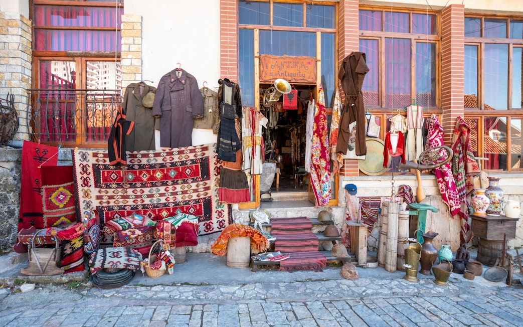 Traditional crafts and antiques displayed at the old bazaar in Kruje, Albania.