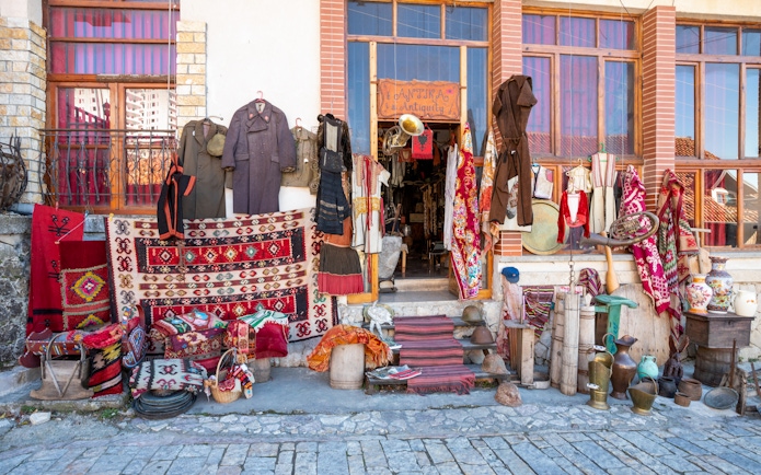Traditional crafts and antiques displayed at the old bazaar in Kruje, Albania.