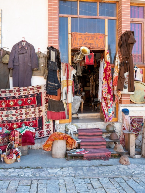 Traditional crafts and antiques displayed at the old bazaar in Kruje, Albania.