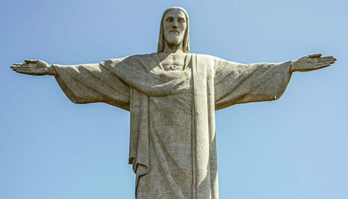 Christ the Redeemer statue with outstretched arms in Rio de Janeiro, Brazil.