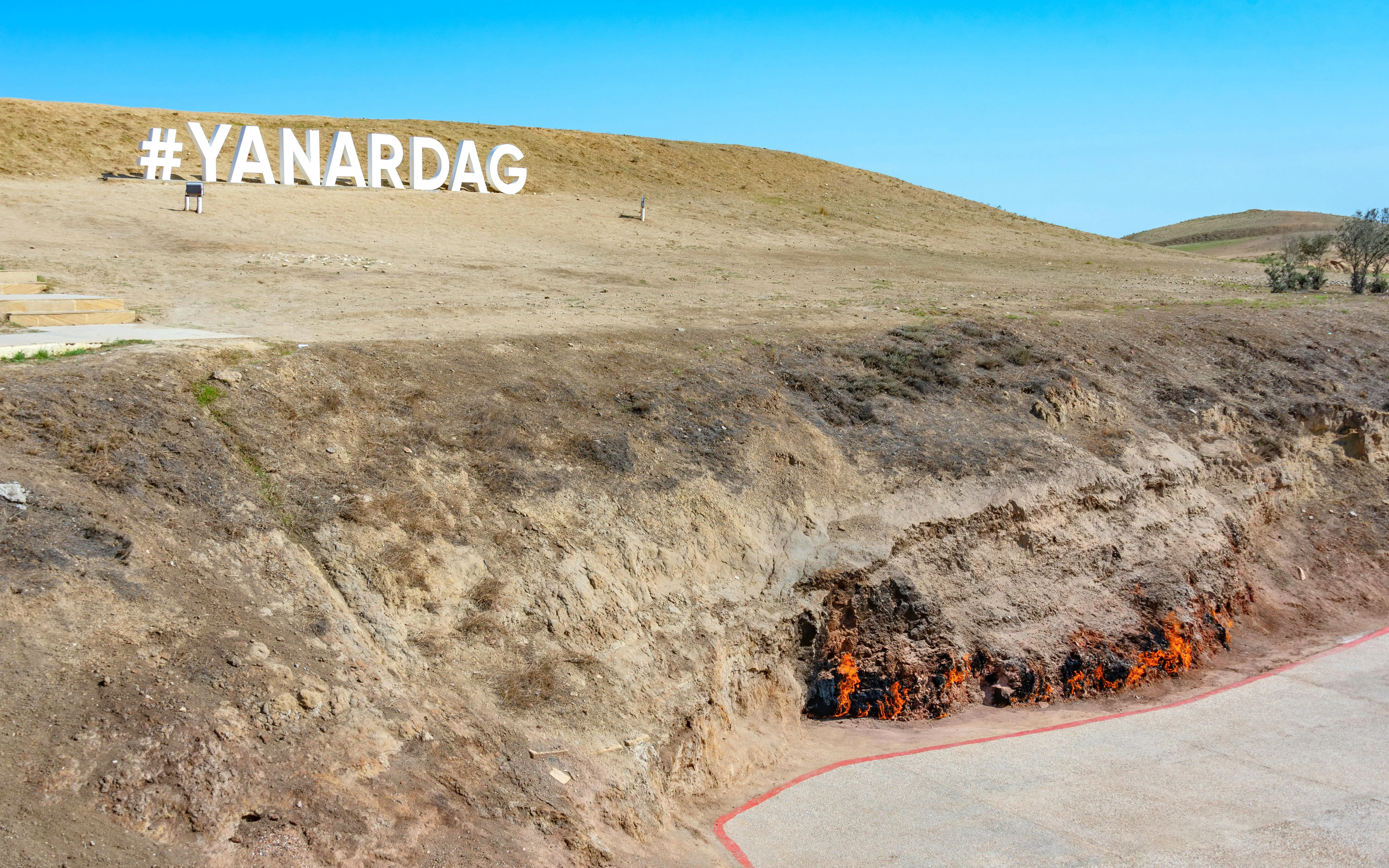 Yanar Dag natural gas fire burning on hillside in Baku, Azerbaijan.