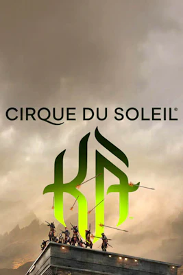 Cirque du Soleil KÀ performers in dynamic acrobatic pose on stage, Las Vegas.