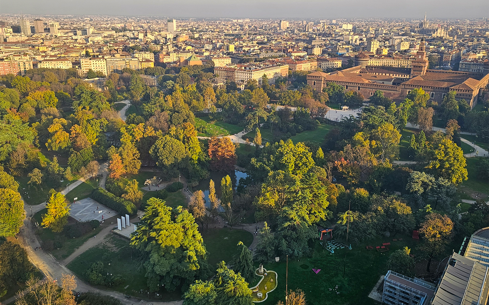 Aerial view of Sforza Castle and lush park in Milan, Italy.