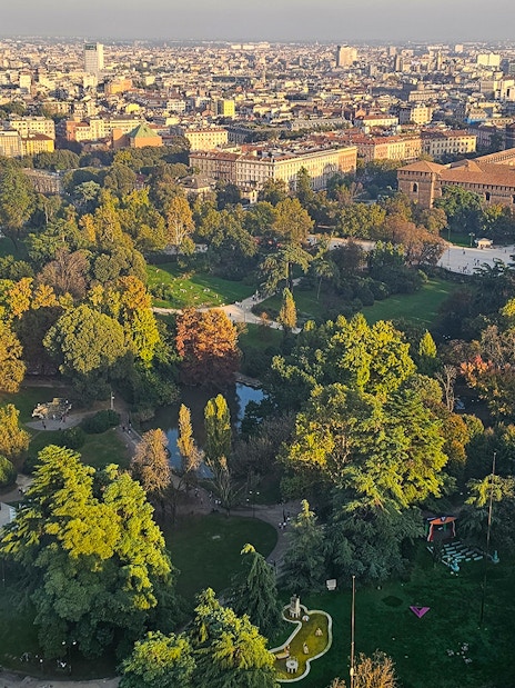 Aerial view of Sforza Castle and lush park in Milan, Italy.