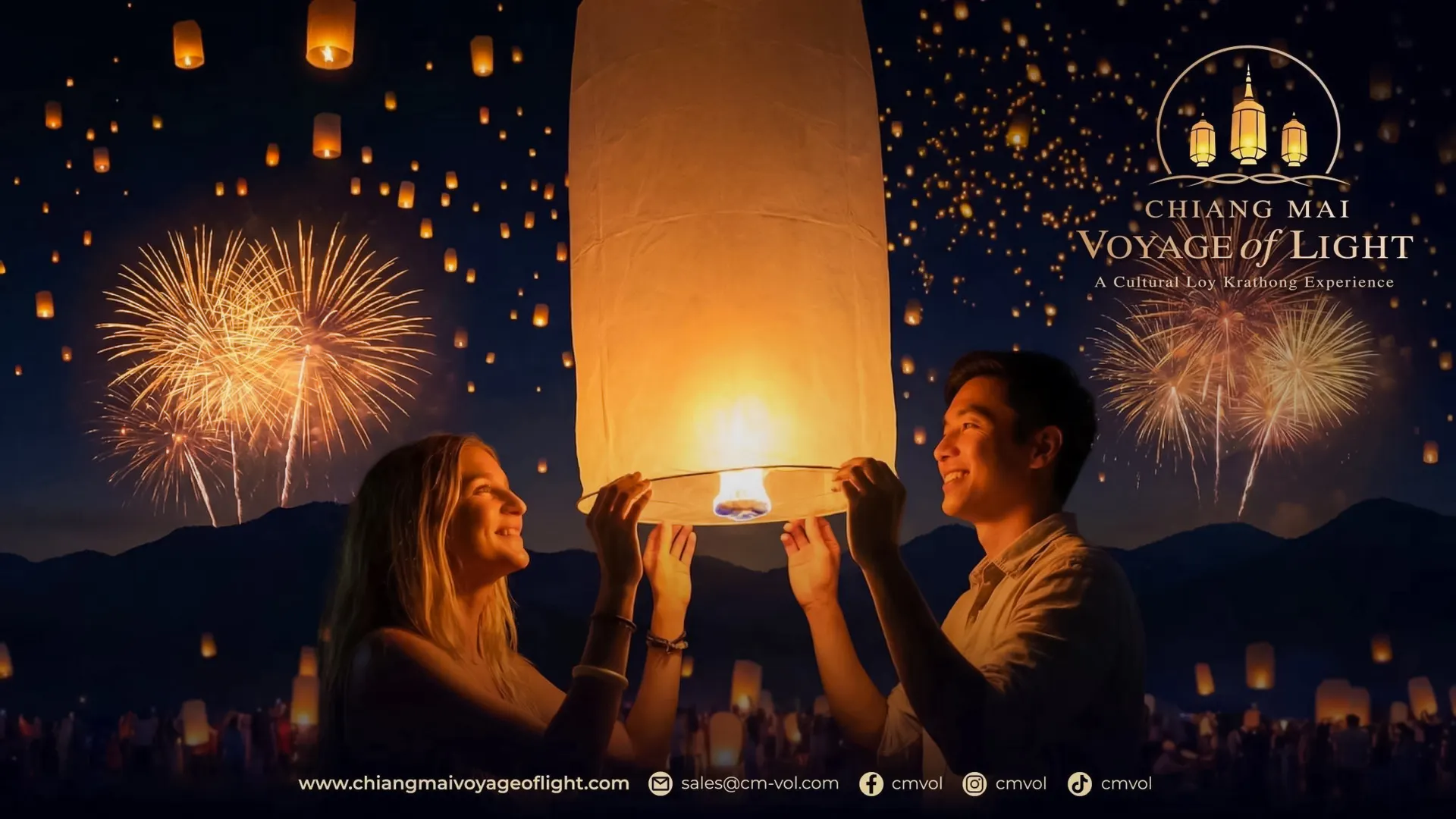 Lantern release during Chiang Mai Voyage of Light festival with fireworks in the background.