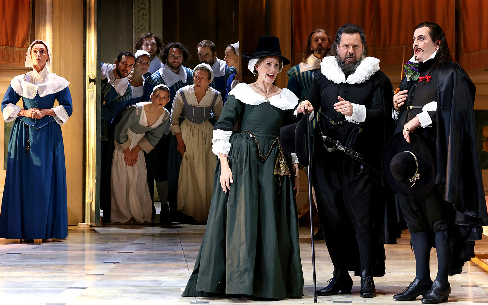 Performers in period costumes on stage during "The Marriage of Figaro" opera.