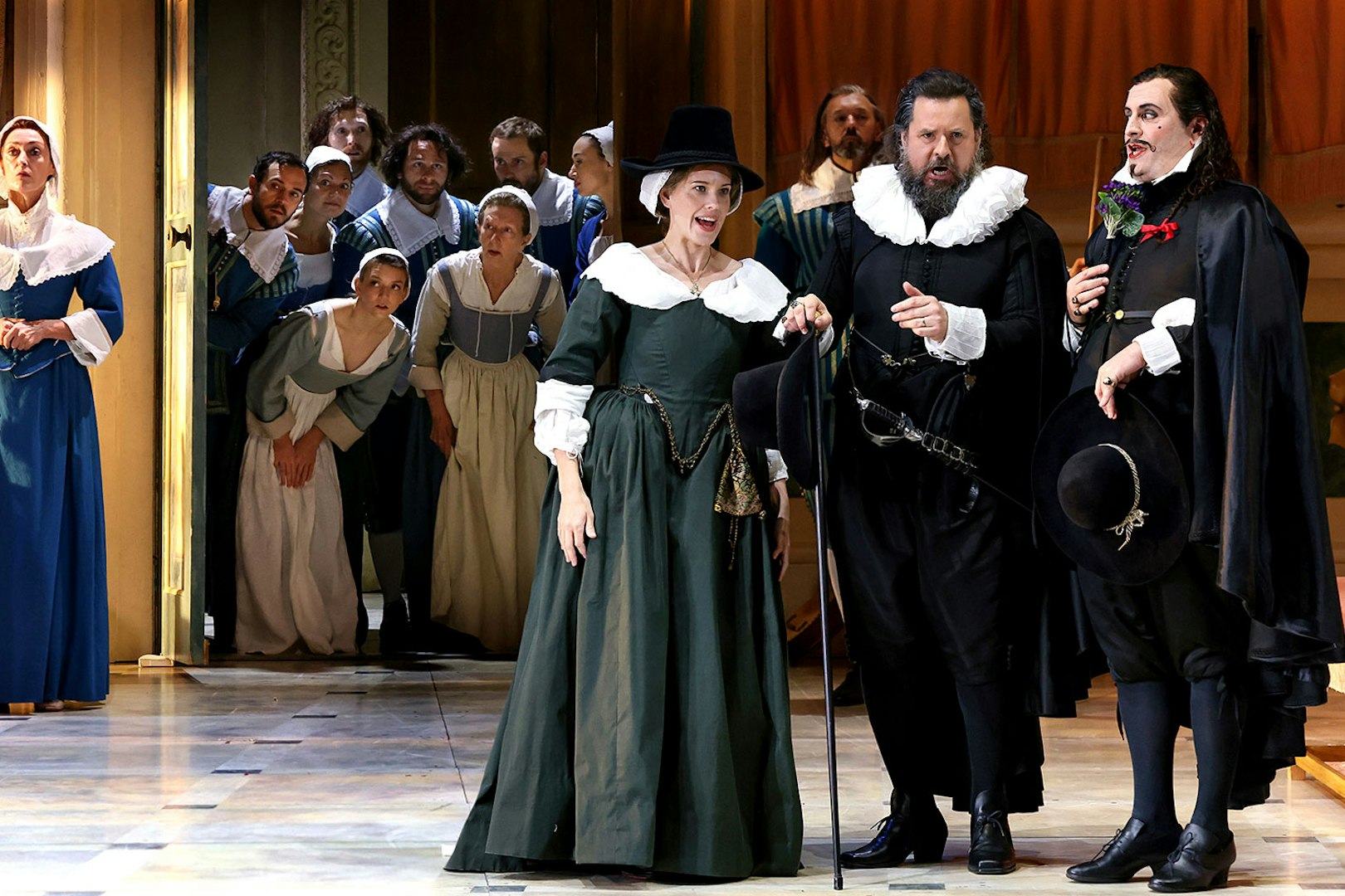 Performers in period costumes on stage during "The Marriage of Figaro" opera.
