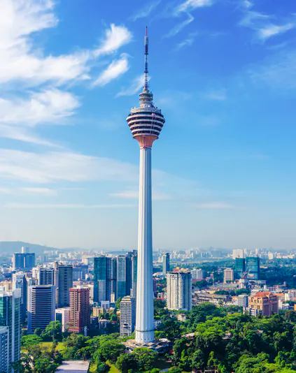 Kuala Lumpur Tower against city skyline, Malaysia Deals & Offers.