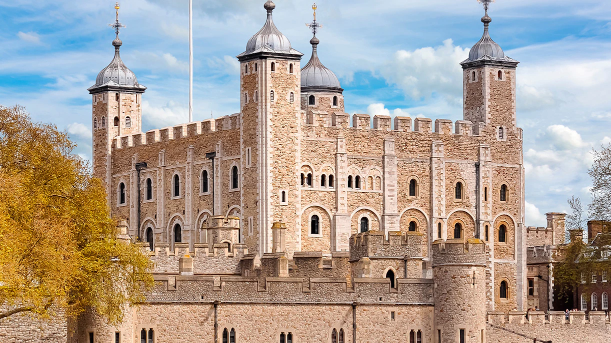 Tower of London with historic stone walls and turrets, United Kingdom.