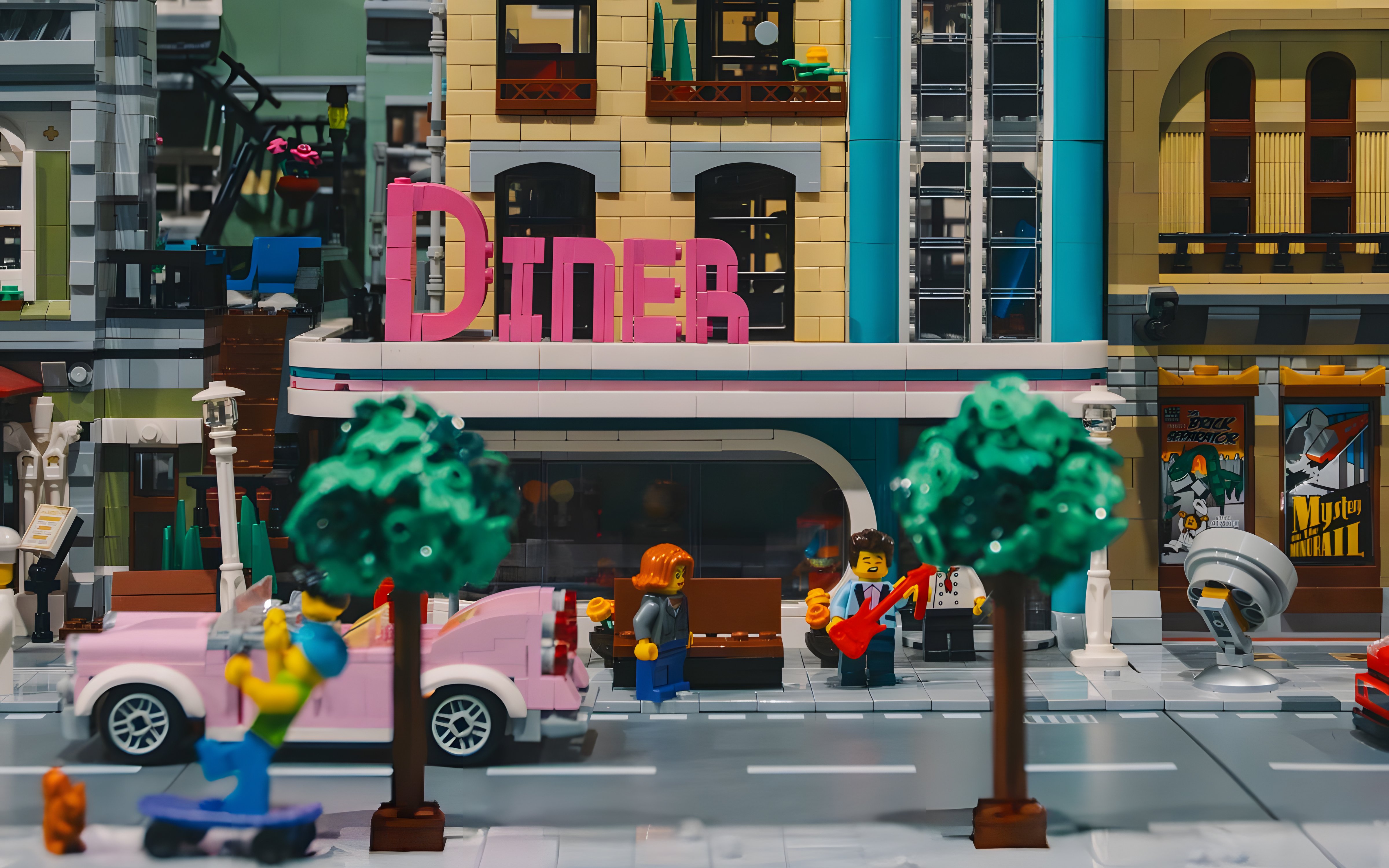 LEGO® cityscape with diner and street scene from BrickWorld exhibition at WOW Porto.