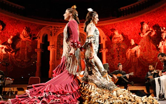 Flamenco dancers performing at Poliorama Theater Gran Gala Flamenco in Barcelona.