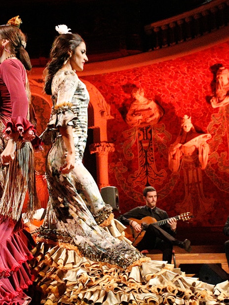 Flamenco dancers performing at Poliorama Theater Gran Gala Flamenco in Barcelona.