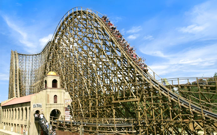 El Toro rollercoaster at Six Flags Great Adventure with riders descending.