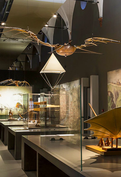 Exhibit of historical flying machines at MuSt: Museum of Science and Technology.