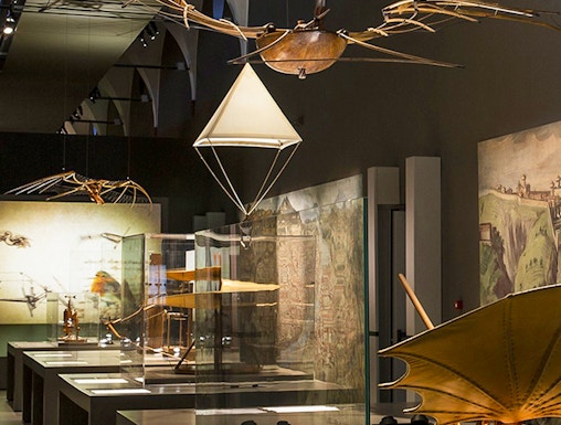 Exhibit of historical flying machines at MuSt: Museum of Science and Technology.