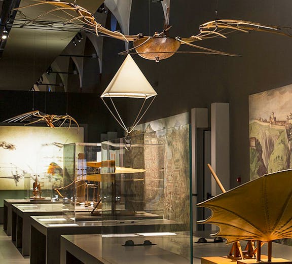 Exhibit of historical flying machines at MuSt: Museum of Science and Technology.