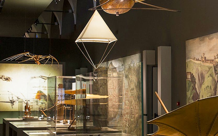 Exhibit of historical flying machines at MuSt: Museum of Science and Technology.