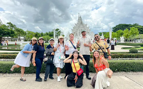 Tour group at White Temple, Chiang Rai, part of Chiang Mai to Chiang Rai tour.