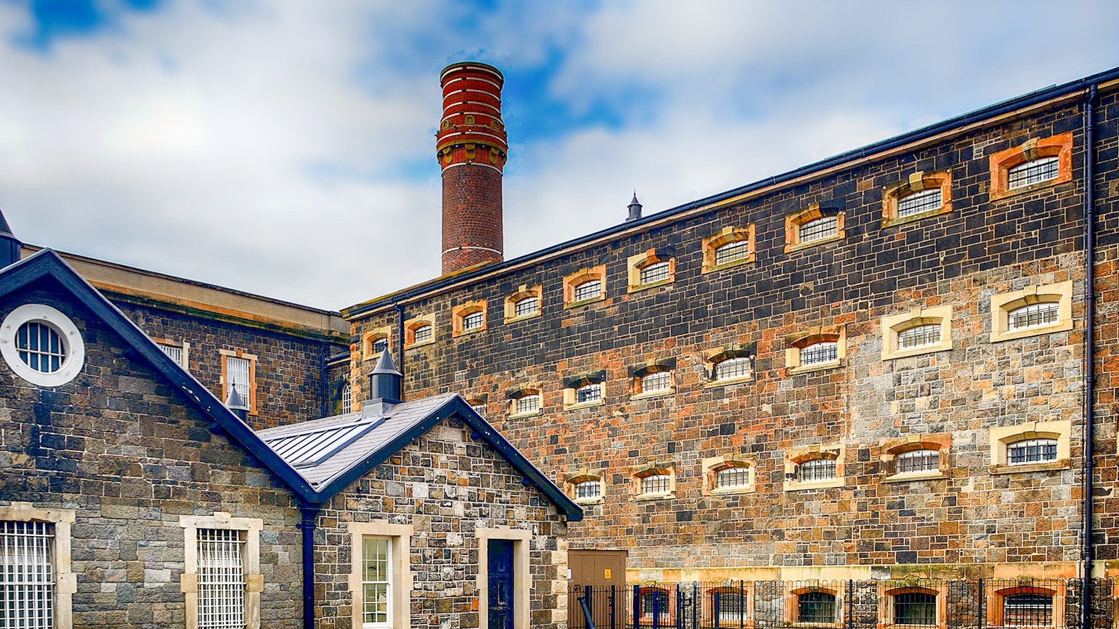 Crumlin Road Jail exterior with historical architecture in Belfast, Northern Ireland.