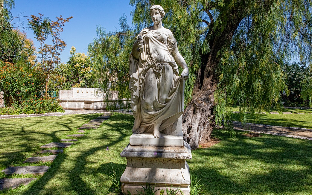 Statue in the garden of the National Museum of Ancient Art, Lisbon.