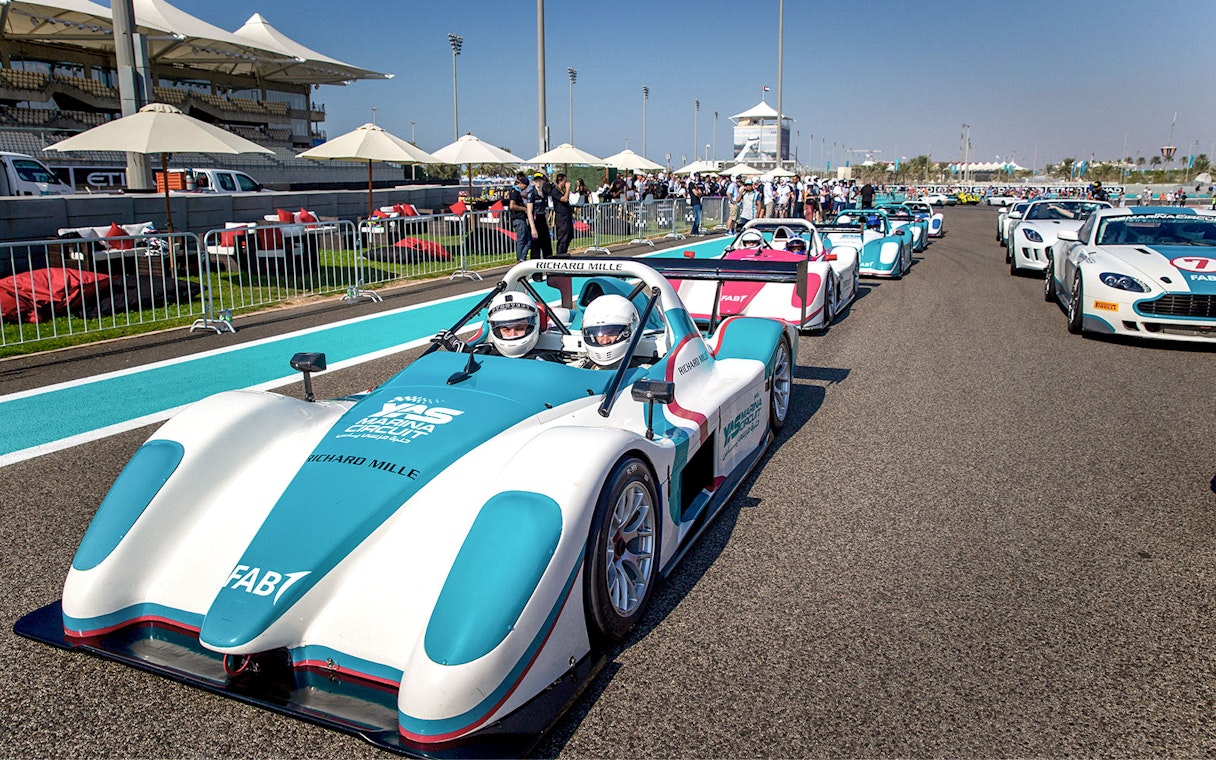 Race cars lined up for the YAS Radical SST Passenger experience at Yas Marina Circuit.