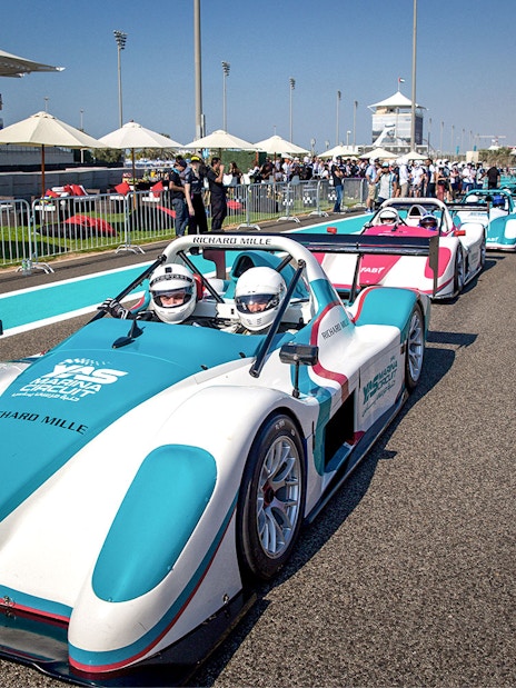 Race cars lined up for the YAS Radical SST Passenger experience at Yas Marina Circuit.