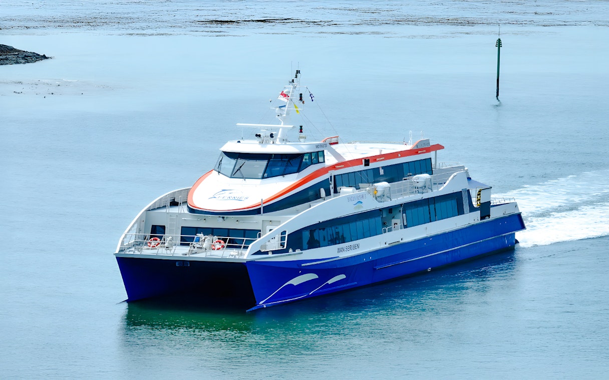 Ferry traveling from Singapore to Bintan Resorts across calm waters.