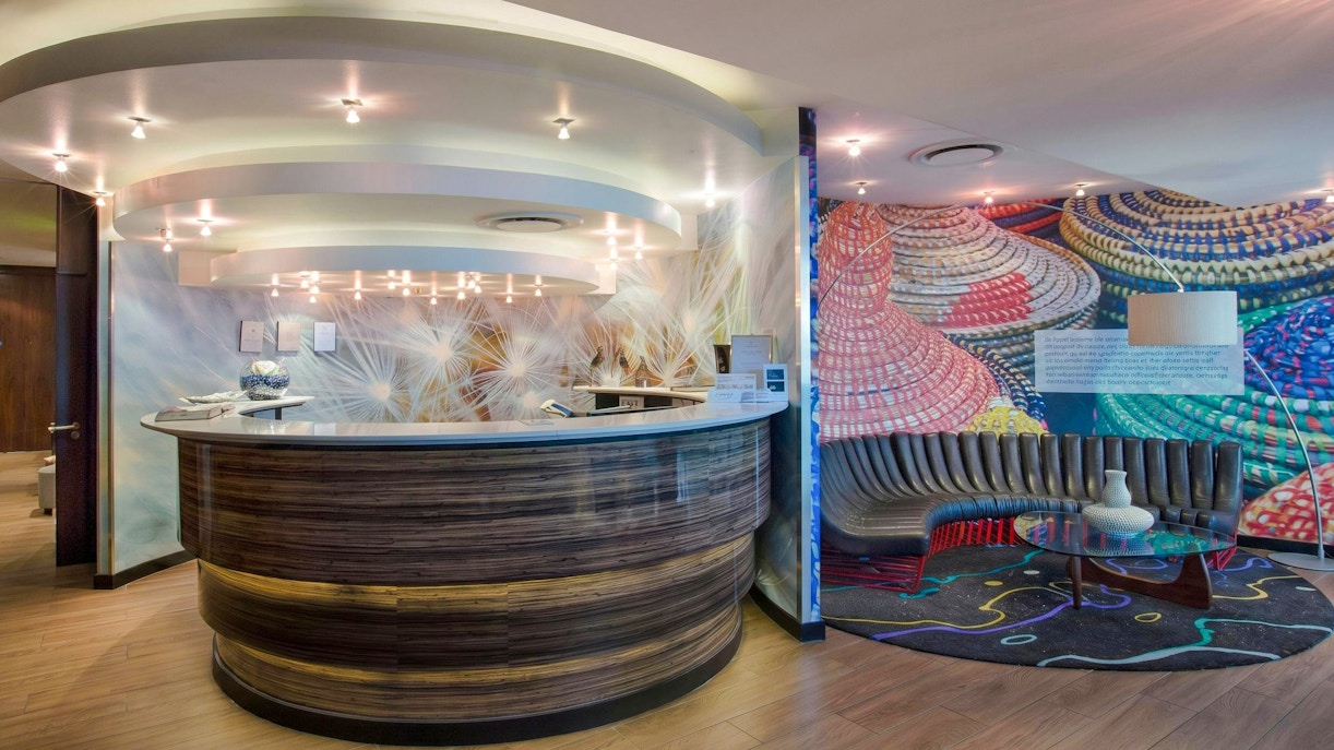 Shongololo Lounge reception area with modern decor at O. R. Tambo International Airport Terminal A, Johannesburg.