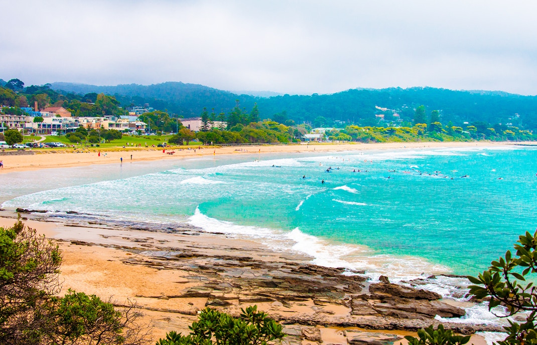 Lorne Beach along Great Ocean Road with waves and sandy shoreline.