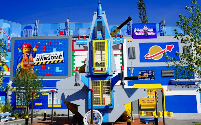 Benny's Playship attraction at LEGOLAND Billund with colorful LEGO-themed decor.