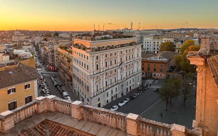Rooftop view from Basilica of Santa Maria Maggiore overlooking Rome at sunset.