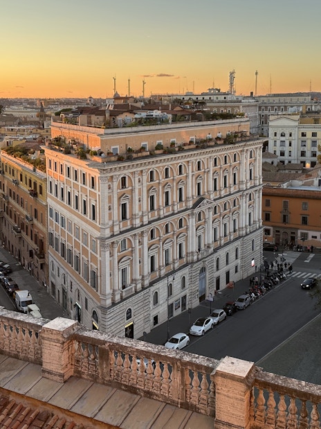 Rooftop view from Basilica of Santa Maria Maggiore overlooking Rome at sunset.