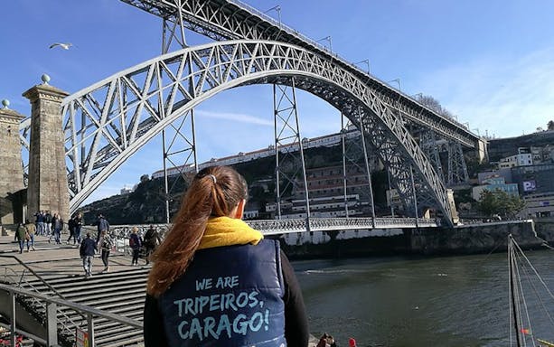 Riders on Segways exploring Porto's historic streets and landmarks.