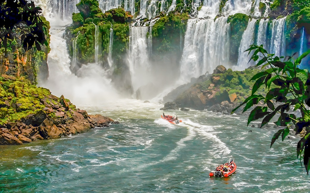 Tourist boat approaching Iguazú Falls on the Brazilian side.