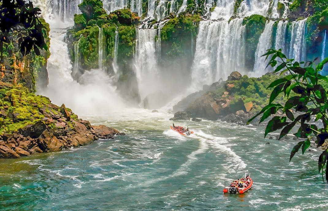 Tourist boat approaching Iguazú Falls on the Brazilian side.