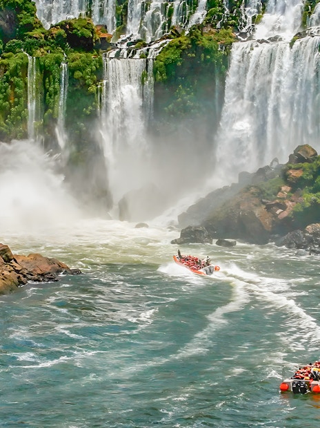 Tourist boat approaching Iguazú Falls on the Brazilian side.