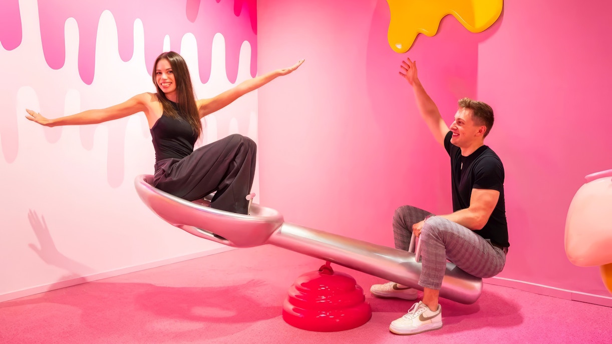 Visitors enjoying a seesaw at the Museum of Candy in Dubai.