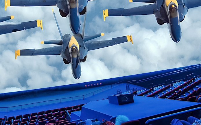 Aircraft display at Technik Museum Speyer with jets flying over a theater.