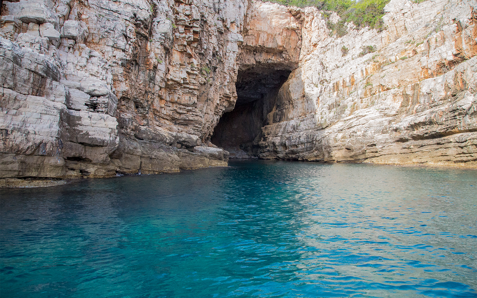 Blue Cave entrance on Dubrovnik boat tour to Elaphiti Islands.