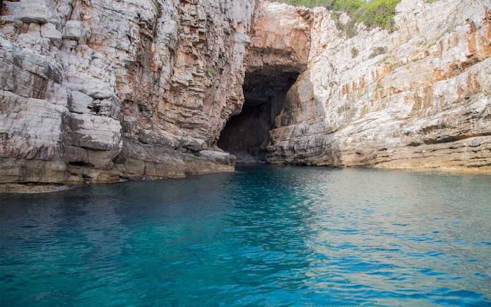 Blue Cave entrance on Dubrovnik boat tour to Elaphiti Islands.