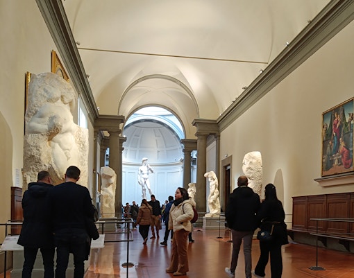 Michelangelo's unfinished sculptures in Hall of the Prisoners, Accademia Gallery, Florence.
