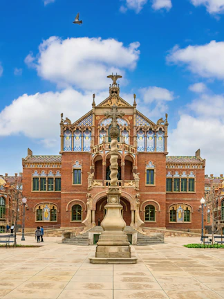 Hospital de la Santa Creu i Sant Pau facade with intricate Art Nouveau architecture in Barcelona, Spain.