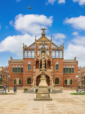 Hospital de la Santa Creu i Sant Pau facade with intricate Art Nouveau architecture in Barcelona, Spain.