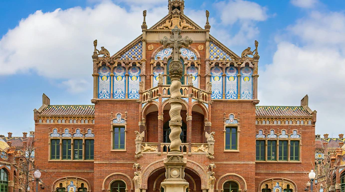 Hospital de la Santa Creu i Sant Pau facade with intricate Art Nouveau architecture in Barcelona, Spain.