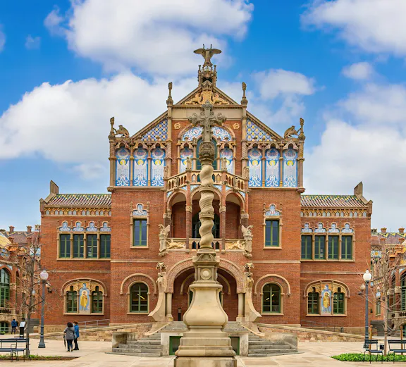 Hospital de la Santa Creu i Sant Pau facade with intricate Art Nouveau architecture in Barcelona, Spain.