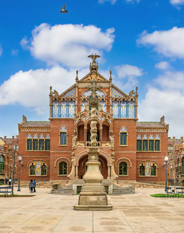 Hospital de la Santa Creu i Sant Pau facade with intricate Art Nouveau architecture in Barcelona, Spain.
