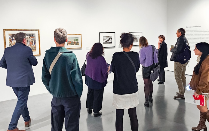 Visitors viewing artwork at Picasso's Birthplace Museum.