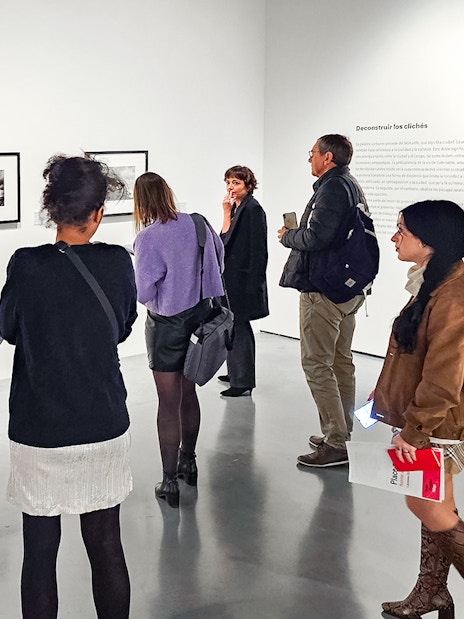 Visitors viewing artwork at Picasso's Birthplace Museum.