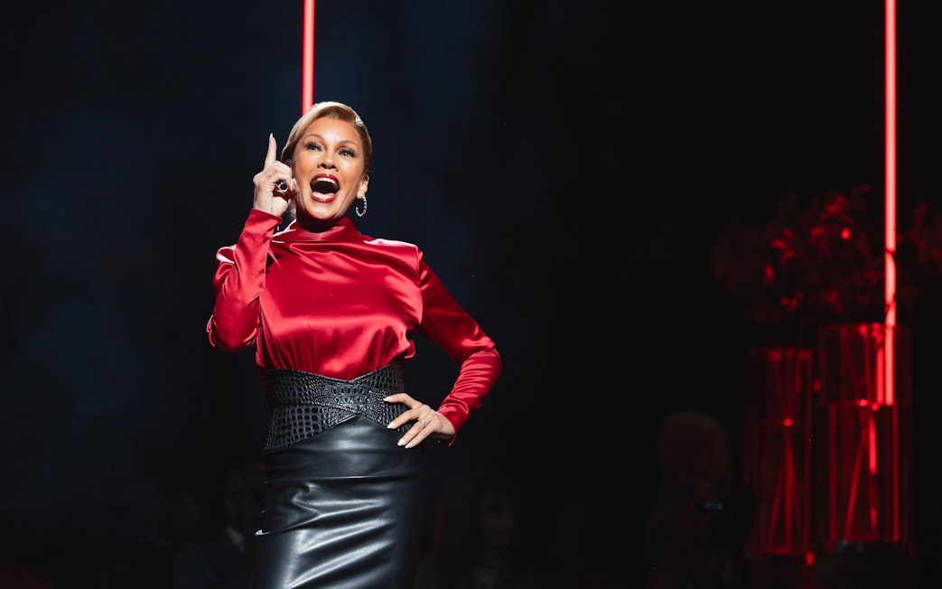 Performer on stage during The Devil Wears Prada West End show.