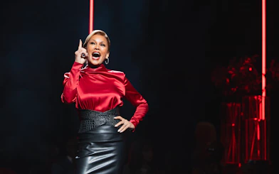 Performer on stage during The Devil Wears Prada West End show.